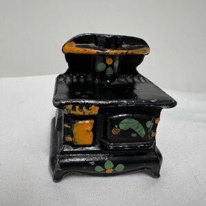 Vintage Hand Painted Cast Iron Stove Small Salt Shaker.